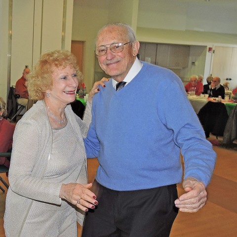 Sharing a Dance at the Annual Jingle Mingle