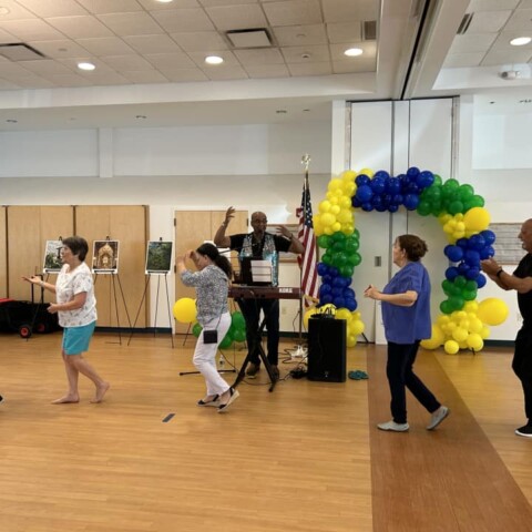 Jose Paulo and members dancing at the Brazilian Cultural Celebration